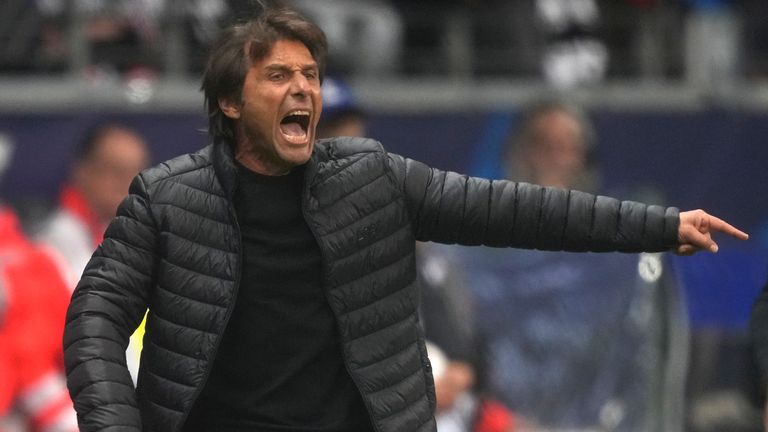 Tottenham's head coach Antonio Conte reacts during the Champions League Group D soccer match between Eintracht Frankfurt and Tottenham Hotspurs in Frankfurt, Germany, Tuesday, Oct.4, 2022. (AP Photo/Michael Probst)