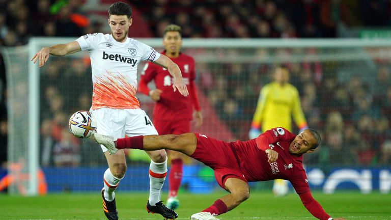 Thiago Alcantara is challenged by Declan Rice