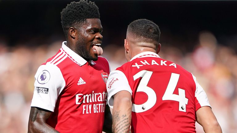 Thomas Partey celebrates his opener with Granit Xhaka