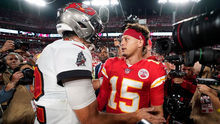 Tampa Bay Buccaneers quarterback Tom Brady (12) and Kansas City Chiefs quarterback Patrick Mahomes (15) greet each other after an NFL football game Sunday, Oct. 2, 2022, in Tampa, Fla. The Chiefs won 41-31. (AP Photo/Chris O'Meara)