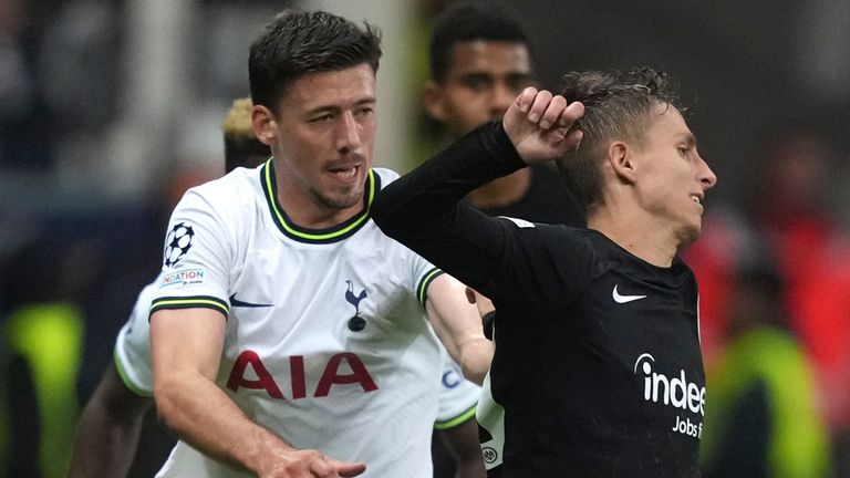 Tottenham's Clement Lenglet, left, challenges for the ball with Frankfurt's Jesper Lindstrom 