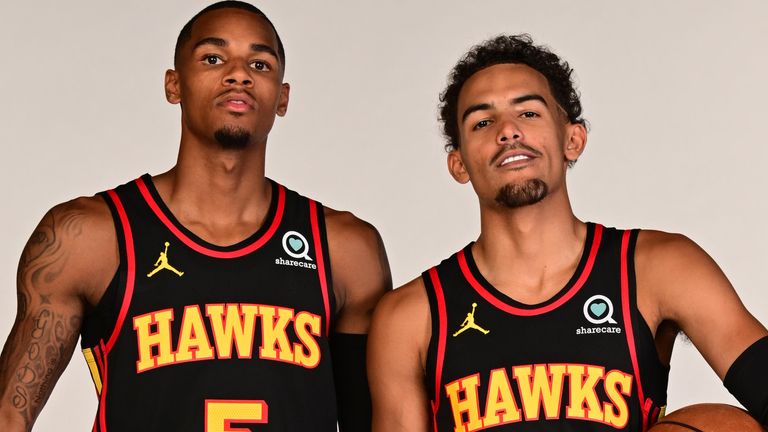ATLANTA, GA - SEPTEMBER 23: Dejounte Murray #5 and Trae Young #11 of the Atlanta Hawks pose for a portrait during NBA Media Day on September 23, 2022 at PC&E Studio in Atlanta, Georgia. NOTE TO USER: User expressly acknowledges and agrees that, by downloading and or using this Photograph, user is consenting to the terms and conditions of the Getty Images License Agreement. Mandatory Copyright Notice: Copyright 2022 NBAE (Photo by Adam Hagy/NBAE via Getty Images)
