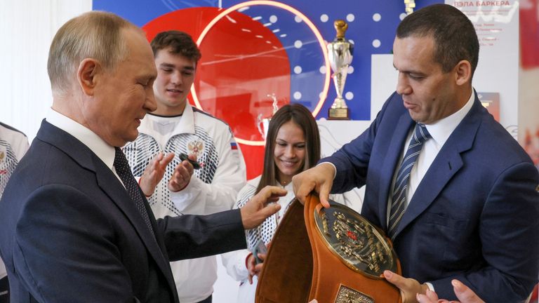 Umar Kremlev (right) with Russian President Vladimir Putin at the opening of the boxing center last month (Gavriil Grigorov, Sputnik, Kremlin Pool Photos via AP)