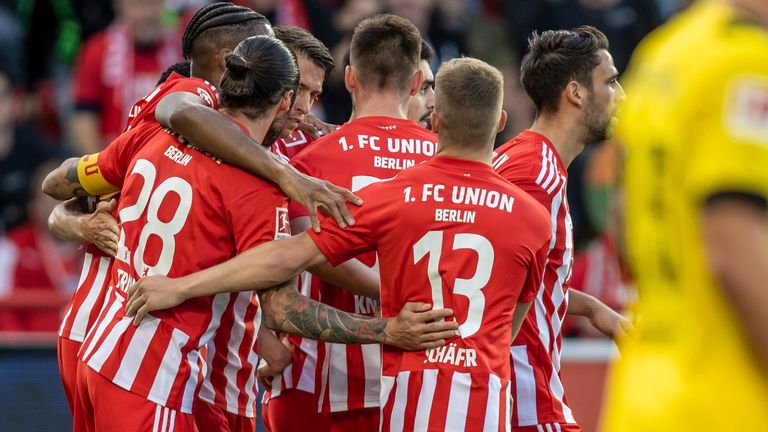 Union Berlin players celebrate a goal against Borussia Dortmund in the Bundesliga