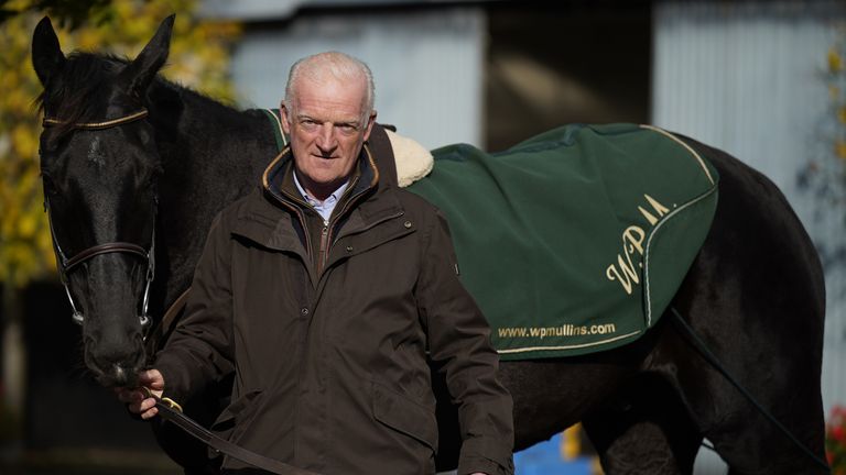 Willie Mullins with Galopin Des Champs at his yard at Closutton