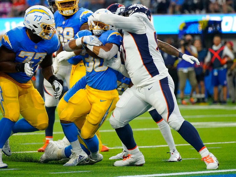 Chargers win in overtime after Denver Broncos botch punt return - Los  Angeles Times