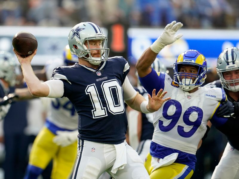 Dominant D puts Cowboys past Rams 22-10 for 4th straight win