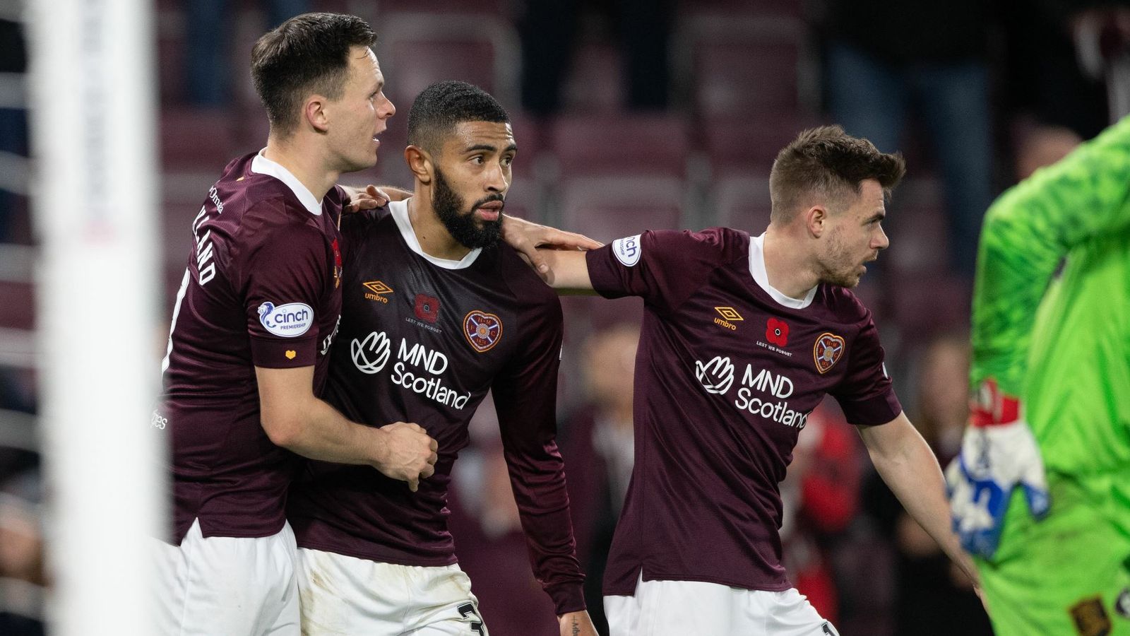 Hearts 1-1 Livingston: Josh Ginnelly salvages late point for 10-man ...