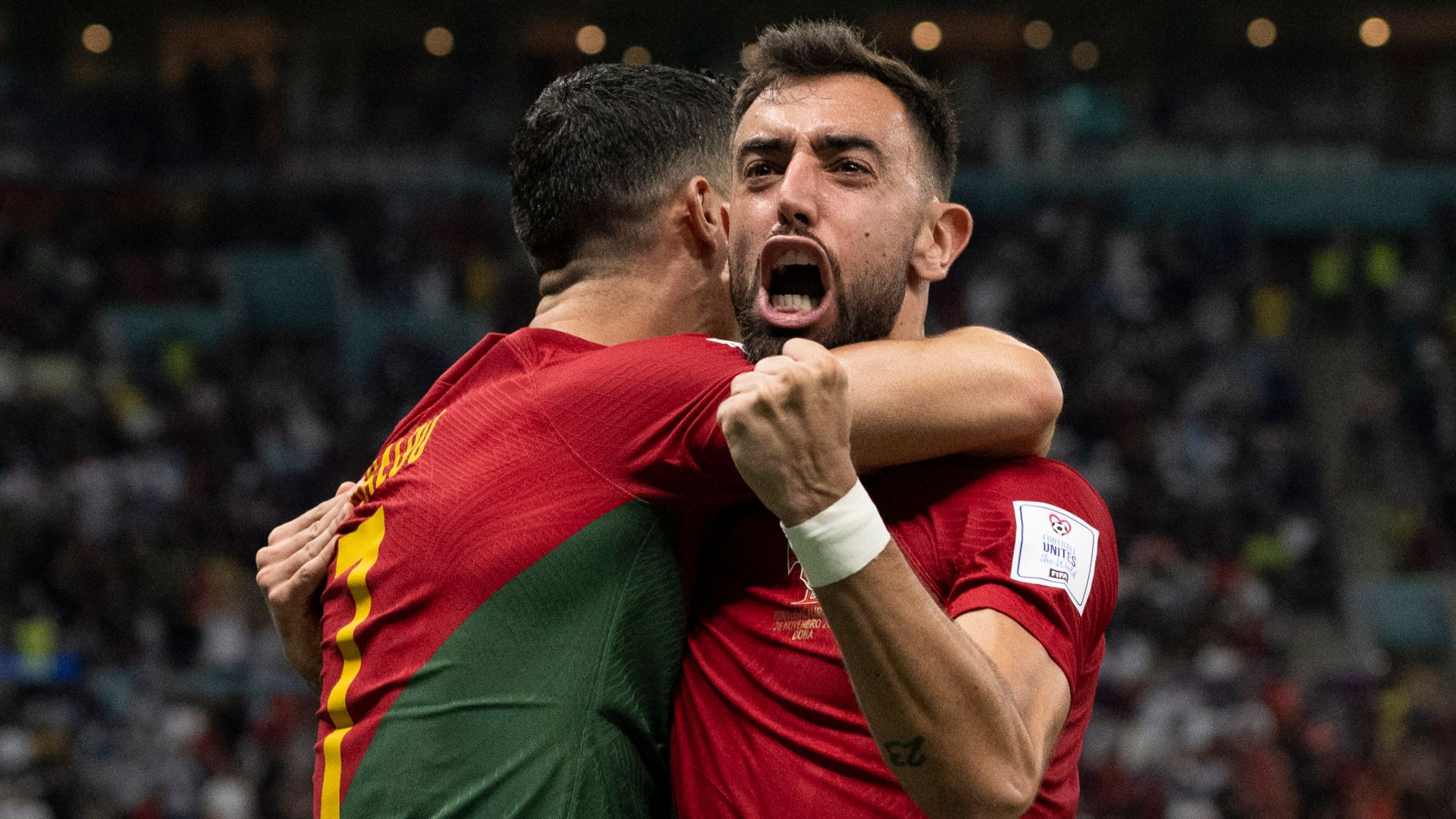 Fernandes' double sends Portugal into last 16 | 'Ronaldo touched ball for opener'