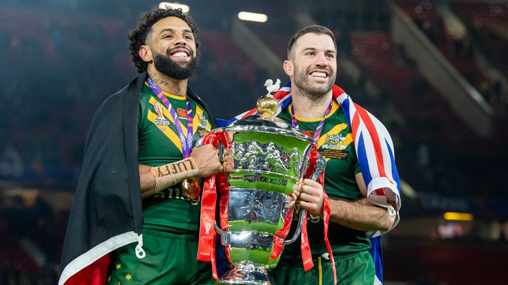 Picture by Allan McKenzie/SWpix.com - 19/11/2022 - Rugby League - Rugby League World Cup 2021 Final - Australia v Samoa - Old Trafford, Manchester, England - Australia's Josh Addo-Carr & James Tedesco with the Rugby League World Cup trophy after victory over Samoa.