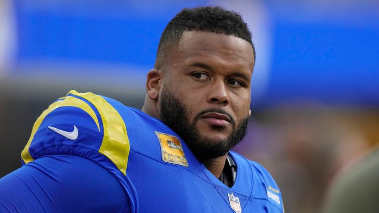 Los Angeles Rams defensive tackle Aaron Donald looks on from the bench during the first half of an NFL football game against the Arizona Cardinals Sunday, Nov. 13, 2022, in Inglewood, Calif. (AP Photo/Mark J. Terrill)