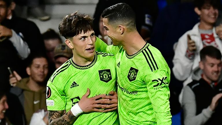 Manchester United&#39;s Alejandro Garnacho, left, celebrates with team-mate Cristiano Ronaldo after scoring vs  Real Sociedad