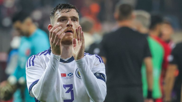 Scotland's Andrew Robertson applauds to supporters at the end his side's defeat to Turkey