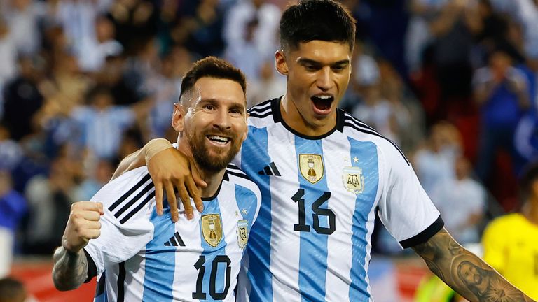 HARRISON, NJ - SEPTEMBER 27: Argentina forward Lionel Messi (10) celebrates with teammate Argentina forward Joaquin Correa (16) after scoring during the international friendly soccer game between Argentina and Jamaica on September 27, 2022 at Red Bull Arena in Harrison, New Jersey. (Photo by Rich Graessle/Icon Sportswire) (Icon Sportswire via AP Images)
