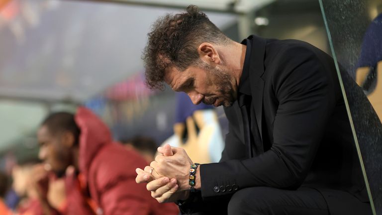 Diego Simeone sits on the bench at Porto
