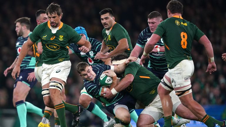 Ireland's Garry Ringrose is tackled by South Africa's Frans Malherbe 