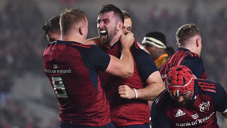 10 November 2022; Munster players celebrate as Diarmuid Barron, hidden, scores their third try during the match between Munster and South Africa Select XV at P..irc Ui Chaoimh in Cork. Photo by David Fitzgerald/Sportsfile