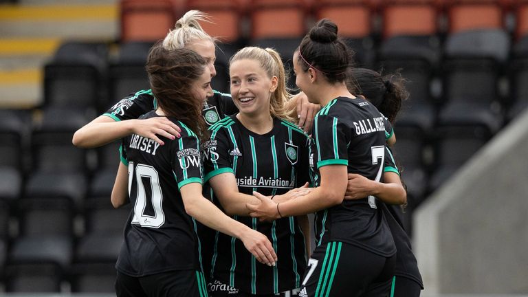 AIRDRIE, SCOTLAND - AUGUST 07: Celtic's Lucy Ashworth-Clifford celebrates with teammates after an own goal makes it 2-0 during a Scottish Women's Premier League match between Celtic Women and Hibernian Women at Penny Cars Stadium, on August 07, 2022, in Airdrie, Scotland.  (Photo by Craig Williamson / SNS Group)