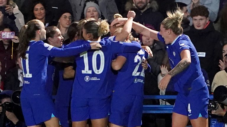 Chelsea celebrate after Erin Cuthbert scored their second goal against Real Madrid in the Champions League