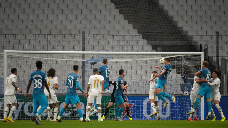 Tottenham's Clement Lenglet heads the ball to score