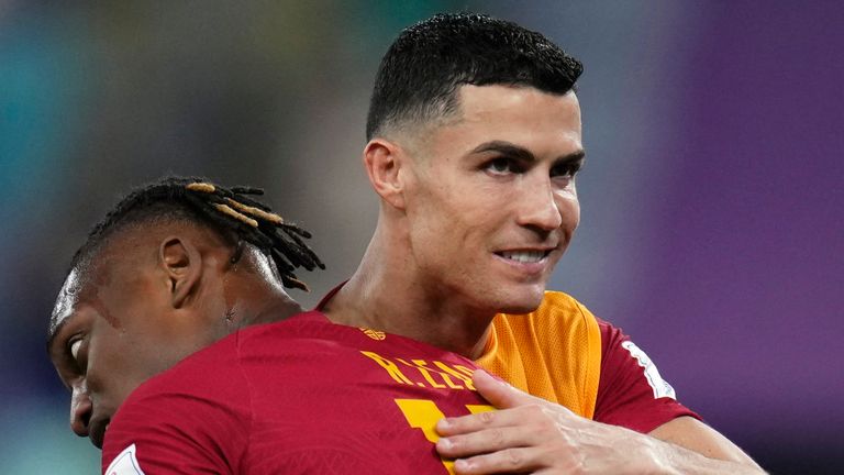 Cristianon Ronaldo embraces Rafael Leao after Portugal's win