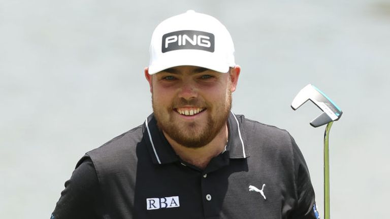 Dan Bradbury maintained his lead into day two at the Joburg Open as lightning affected play.