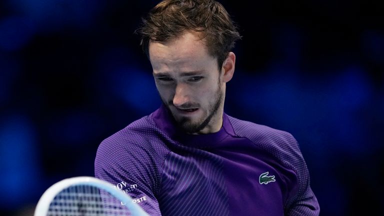 Russia&#39;s Daniil Medvedev returns the ball to Serbia&#39;s Novak Djokovic during their singles tennis match of the ATP World Tour Finals, at the Pala Alpitour in Turin, Italy, Friday, Nov. 18, 2022. (AP Photo/Antonio Calanni)