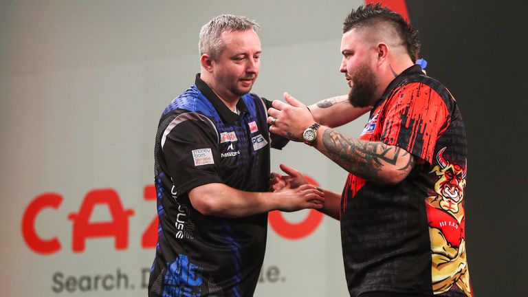 Michael Smith was also eliminated during Day One of the 2022 Cazoo Players Championship Finals. (Kieran Cleeves/PDC)