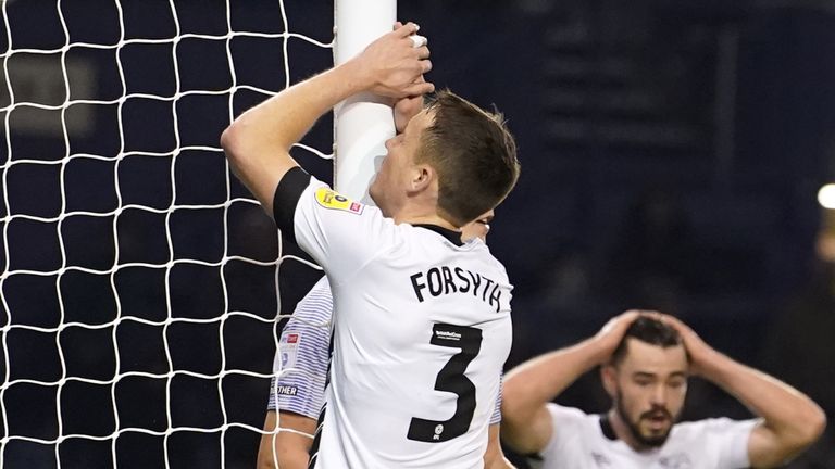 Derby County&#39;s Craig Forsyth reacts after a missed chance during the Sky Bet League One match at Fratton Park, Portsmouth. Picture date: Friday November 18, 2022.