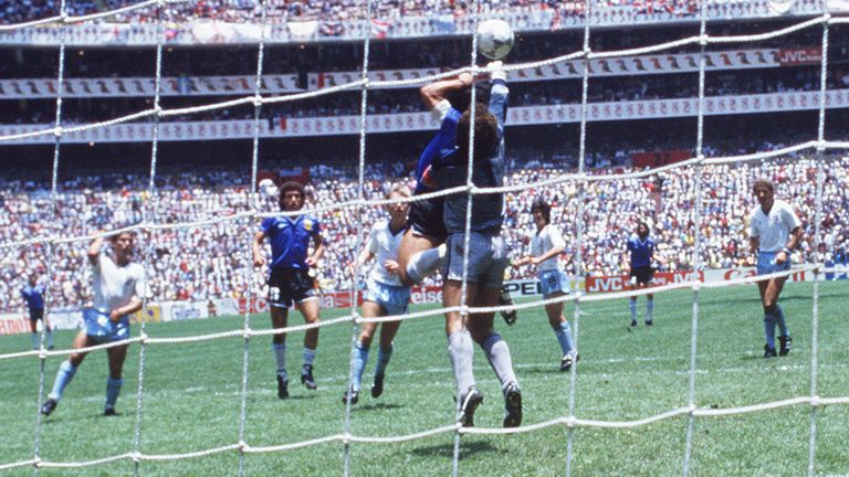 Diego Maradona scores against England with the infamous 'Hand of God'