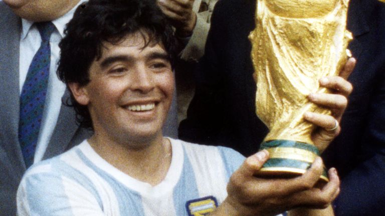 Diego Maradona pictured with the World Cup trophy in 1986
