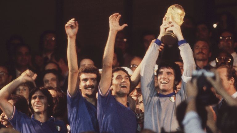 Italy captain and goalkeeper Dino Zoff holds the World Cup trophy aloft in 1982