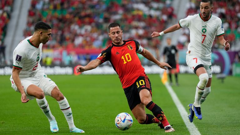 Eden Hazard runs up against Morocco&#39;s Achraf Hakimi (left) and Hakim Ziyech