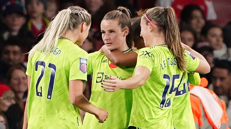 Ella Toone is mobbed by her team-mates after scoring for Manchester United at Arsenal