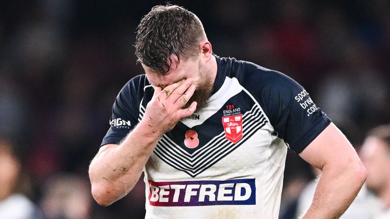 England try-scorer Elliott Whitehead looks dejected at full time after the semi-final defeat to Samoa