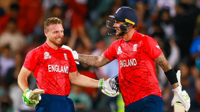 England's Jos Buttler, left, and Alex Hales celebrate after the T20 World Cup cricket semifinal between England and India in Adelaide, Australia, Thursday, Nov. 10, 2022. England defeated India by ten wickets. (AP Photo/James Elsby)