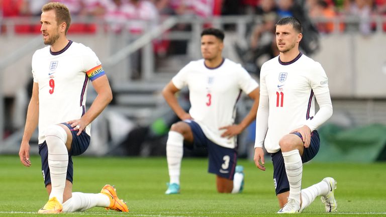 Harry Kane kneels ahead of England's League One match with Hungary