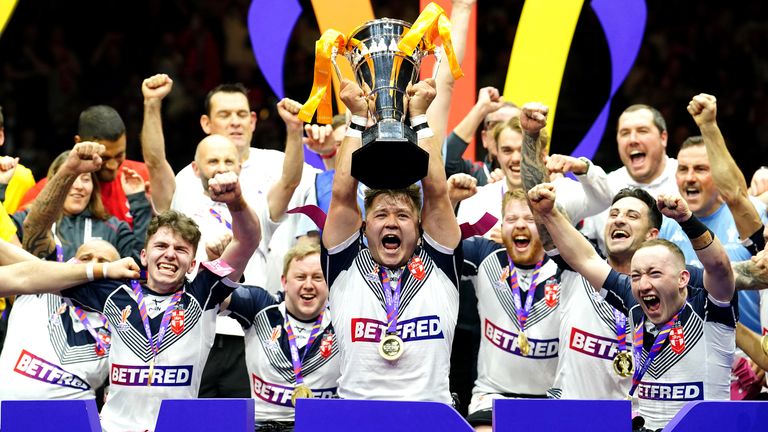 England v France - Wheelchair Rugby League World Cup - Final - Manchester Central
England's Tom Halliwell lifts the trophy with team-mates after victory in the Wheelchair Rugby League World Cup final match at Manchester Central. Picture date: Friday November 18, 2022.