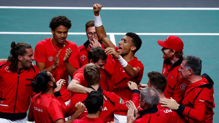 Felix Auger Aliassime at the centre of the winning team (AP Photo/Joan Monfort)