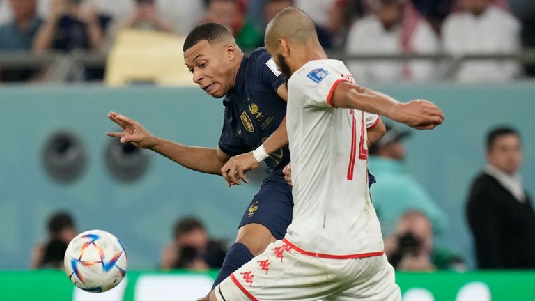 Substitute Kylian Mbappe fires in a shot against Tunisia