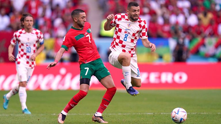 Morocco&#39;s Hakim Ziyech (left) and Croatia&#39;s Mateo Kovacic battle for the ball