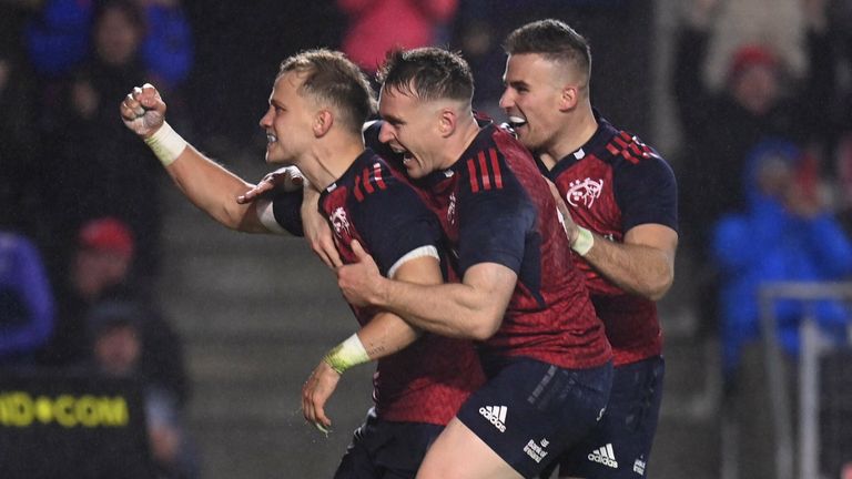 10 November 2022; Mike Haley of Munster celebrates with teammates Rory Scannell and Shane Daly after scoring their side's fourth try during the match between Munster and South Africa Select XV at P..irc Ui Chaoimh in Cork. Photo by Harry Murphy/Sportsfile