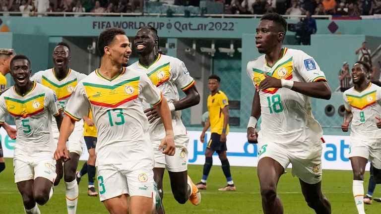 Senegal&#39;s Ismaila Sarr celebrates after converting his penalty