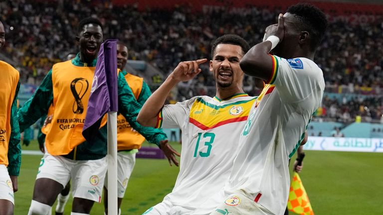 Senegal&#39;s Ismaila Sarr celebrates his goal with team-mates