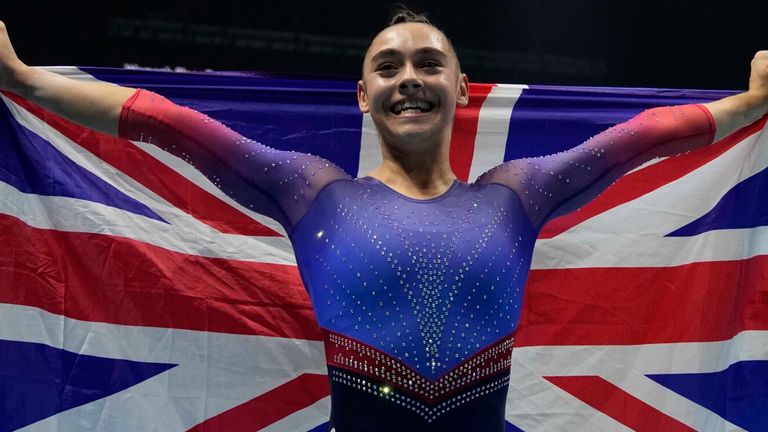 Britain's Jessica Gadirova celebrates winning gold at the M&S Bank Arena in Liverpool
