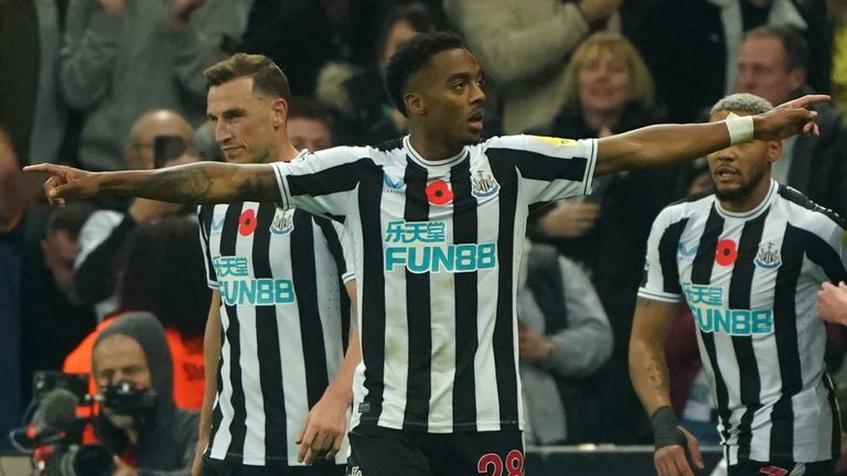 Newcastle United's Joe Willock (front left) celebrates his opener