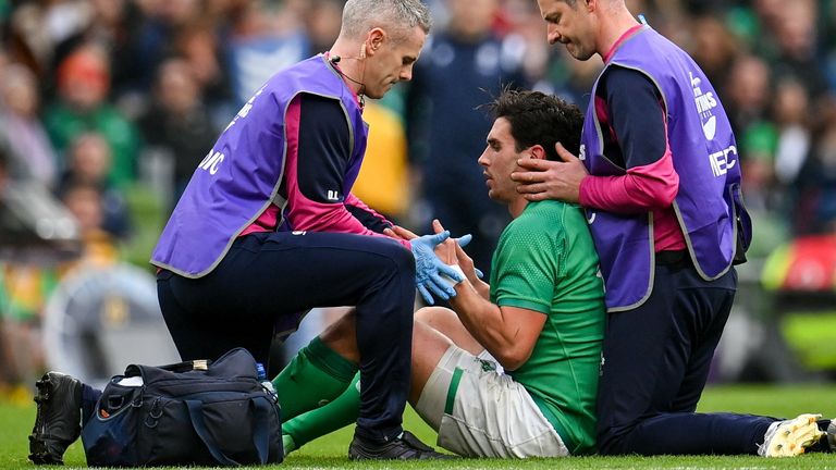 12 November 2022; Joey Carbery of Ireland receives medical attention team doctor Ciaran Cosgrave, left, and team chartered physiotherapist Keith Fox during the Bank of Ireland Nations Series match between Ireland and Fiji at the Aviva Stadium in Dublin. Photo by Seb Daly/Sportsfile