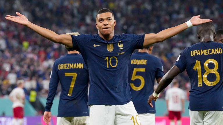 Kylian Mbappe celebrates in front of supporters
