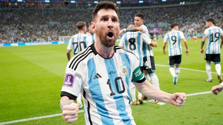Lionel Messi celebrates after scoring Argentina's opening goal