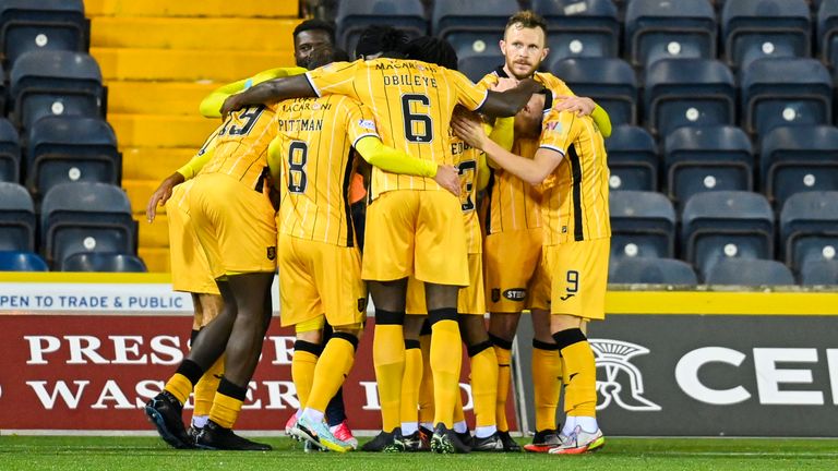 KILMARNOCK, SCOTLAND - NOVEMBER 04: Livingston players celebrate after scoring via an own goal from Chris Stokes during a cinch Premiership match between Kilmarnock and Livingston at Rugby Park, on November 4, 2022, in Kilmarnock, Scotland.  (Photo by Rob Casey / SNS Group)